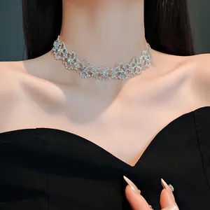 Close-up of elegant shimmering rhinestone choker necklace on model for gala evening wear