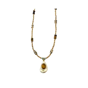 Handmade Maillard style beaded necklace with irregular oval tiger eye stone pendant