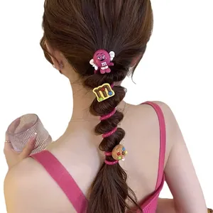 Cute pink phone cord hair ties for bubble braids with colorful cartoon character charms