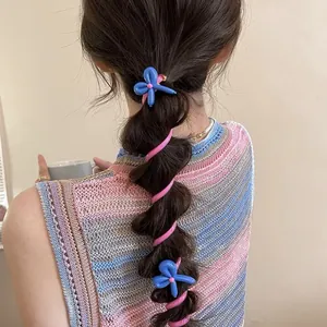 Cute colorful spiral hair tie with blue balloon flower details on bubble braid