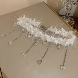 Elegant white plush choker necklace with hanging crystal tassels and silver chains