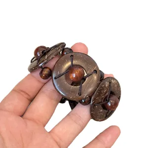 Vintage ethnic style elastic bracelet featuring circular coconut shell and wood beads.