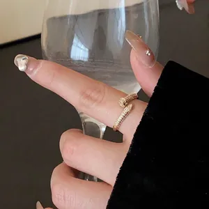 Luxurious gold-plated snake-shaped open ring with sparkling cubic zircon stones