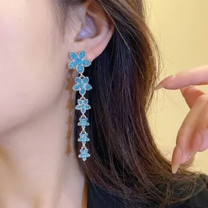 Exquisite silver needle flower tassel earrings with sparkling blue zircon crystals for women