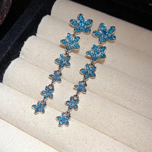 Elegant silver needle drop earrings with sparkling blue zircon flower tassels