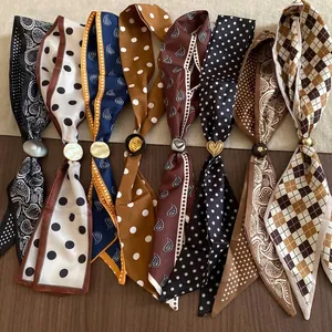 Set di collane in sciarpa di tessuto vintage a pois e paisley in vari colori