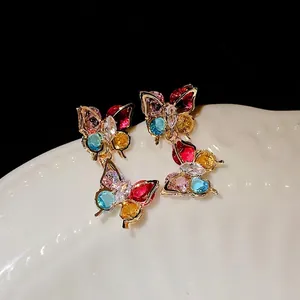 Elegant colorful zircon butterfly drop earrings with stylish gold-finish details