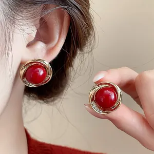 Elegant Chinese style red koi earrings with gold spiral trim and sparkling rhinestones for women