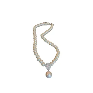 Elegant French vintage style pearl necklace with a sparkling zircon teardrop pendant