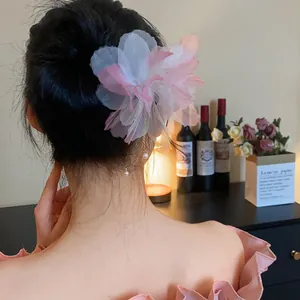 Chiffon flower hairpin with long pearl tassels for elegant vintage hairstyle detail view