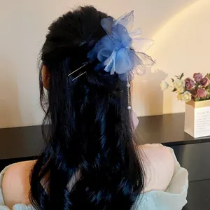Elegant vintage-style blue chiffon flower hair pin with a delicate pearl tassel detail.