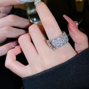 Elegant vintage style silver open ring featuring an intricate floral zircon pavé design.