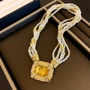 French vintage multi-layer pearl necklace with a large yellow crystal square pendant