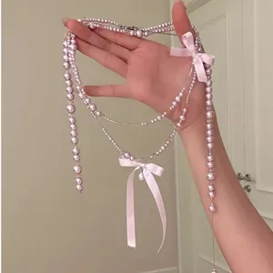 Elegante set di collane di perle rosa in stile francese con dolci fiocchi di nastro rosa