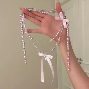 Elegante collana di perle rosa con fiocchi di nastro per dolce stile francese.