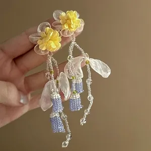 Handmade lily of the valley glass beaded tassel earrings with yellow chiffon flower details