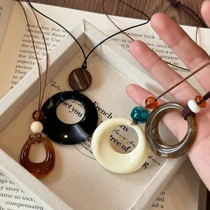 Handcrafted New Chinese style resin circle pendant necklace for women's sweaters