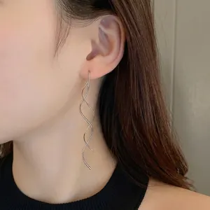 Minimalist real gold plated wave geometric long threader earrings shown on model
