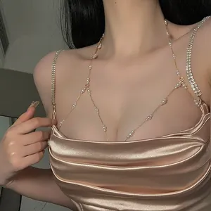 Elegant gold-tone body chain with pearls for sexy backless beach or evening outfits.