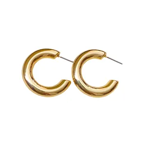 Elegant minimalist C-shaped chunky gold hoop earrings for women with a high-polish finish