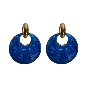 Orecchini vintage a bottone in smalto blu con design geometrico e dettagli dorati per donna