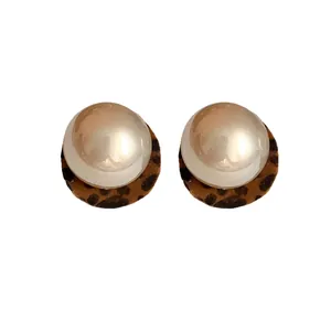 Elegant round pearl stud earrings with leopard print fabric base for women's daily wear