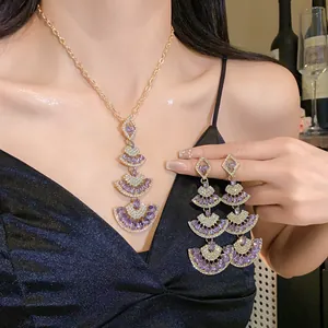 Luxury purple fan-shaped pendant necklace and earrings set with crystal rhinestones