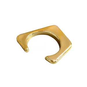 Bracelet jonc ouvert géométrique irrégulier moderne avec finition dorée polie