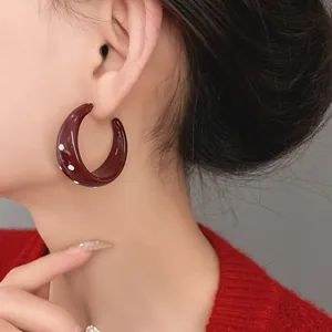 Elegant vintage burgundy polka dot hoop earrings with a glossy enamel finish for women.