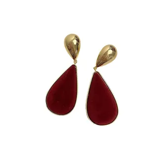 Vintage gold-tone teardrop earrings featuring elegant red velvet inlay for autumn and winter