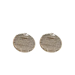 Exaggerated silver-tone hoop earrings paved with glamorous sparkling cubic zirconia stones