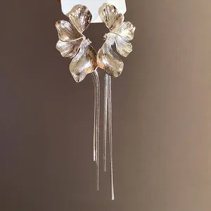 Elegant vintage silver flower tassel earrings featuring a luxury handcrafted design for women.
