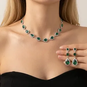 Elegant emerald green water drop necklace and earring jewelry set with sparkling crystals