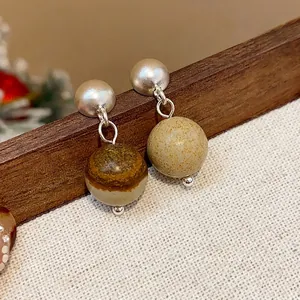 Elegant vintage matte silver dome drop earrings with natural stone textured round beads