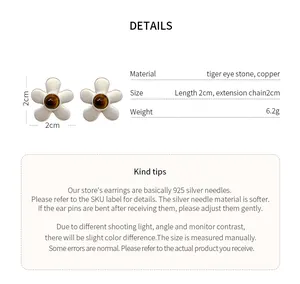 Detailed product specifications for matte flower earrings with tiger eye stone center