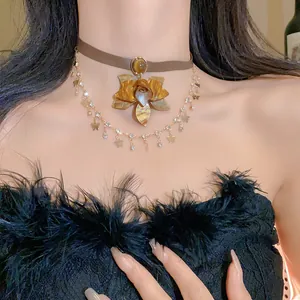 Detailed close-up of vintage butterfly and flower layered necklace set on model neck