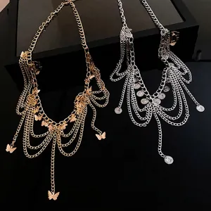 Eleganti catene da vita in metallo a strati per donna con nappine a farfalla e monete.