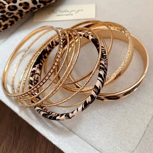Stylish vintage leopard print and gold-tone metal stacking bangle set for women jewelry