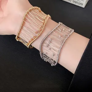 Elegant French vintage woven hollow mesh cuff bracelets in gold and silver finish.