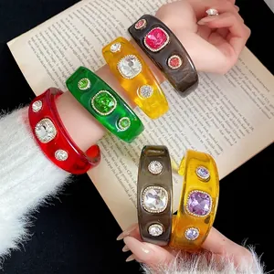 Vintage resin chunky bangles with large crystal inlays in multiple vibrant colors.