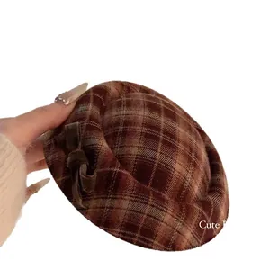 Elegant vintage brown plaid fabric beret style hair clip with a small bow detail
