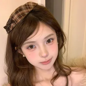 Sweet vintage plaid beret hair clip shown on model for a trendy autumn winter styling