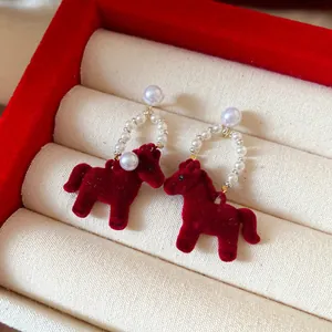 Elegant red velvet horse earrings with white pearl hoop variant in retro Chinese style