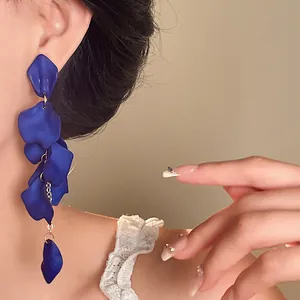 Elegant blue petal tassel earrings with matte finish for a bohemian vacation style.