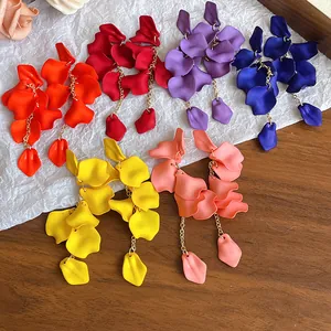 Close-up of vibrant matte petal tassel earrings in various colors for a bohemian summer look