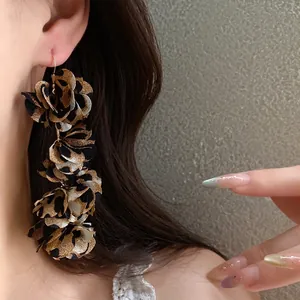 Handmade long leopard print fabric flower drop earrings for women with trendy design.