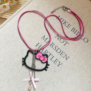 Pink cord necklace with black Hello Kitty silhouette pendant and pink ribbon bow