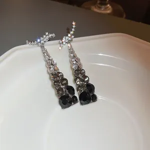 Elegant long tassel earrings with black and grey gradient zircon stones in silver finish