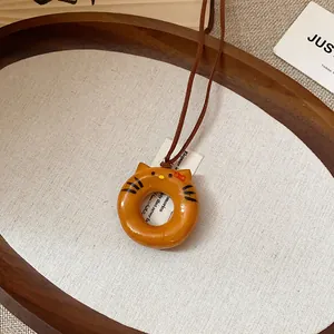 Elegant vintage cat-shaped wooden donut pendant necklace with Zen style brown cord