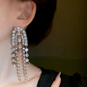 Elegant silver needle long drop earrings with sparkling rhinestone tassels for women.